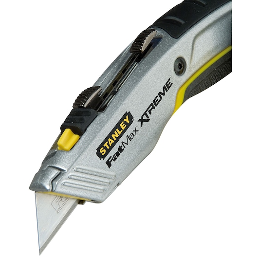 STANLEY 0-10-789 FatMax XTREME utility knife, silver and black, close-up side angle on white background.