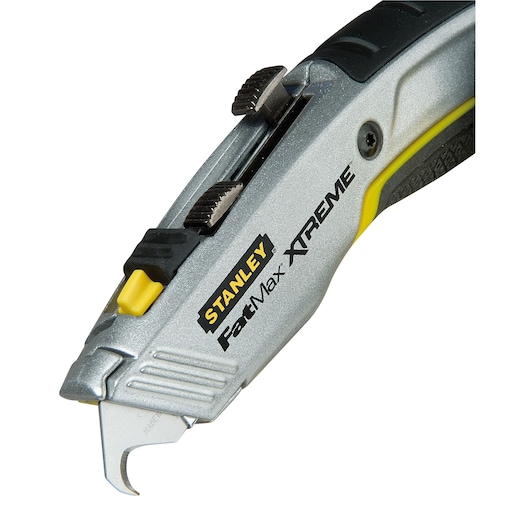 STANLEY 0-10-789 utility knife with hook blade, silver and black, side view on white background.