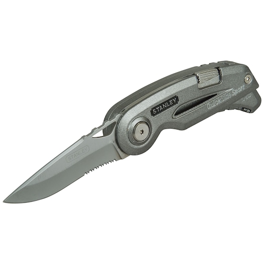 Photo of STANLEY 0-10-813 folding utility knife, gray handle, partially serrated blade, side angle.