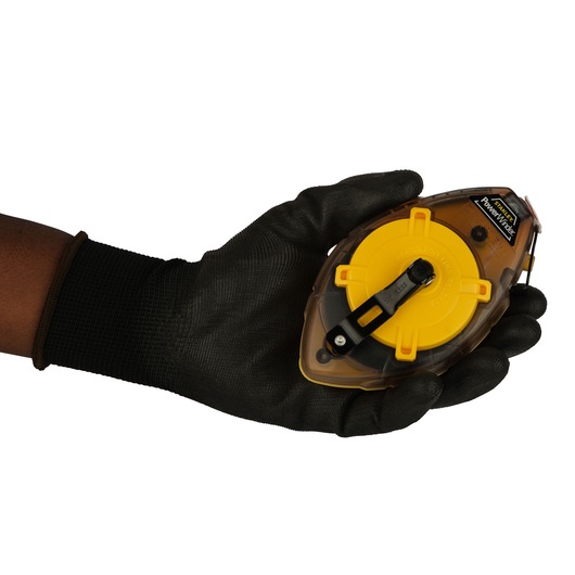 STANLEY 0-47-465 chalk line reel held in a gloved hand, front view, yellow and black casing.