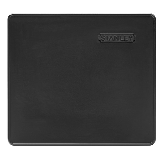 Rectangular black Stanley cutting mat with embossed logo in top right corner.