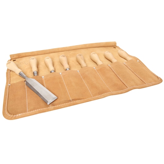 Set of woodworking chisels with wooden handles in a tan leather roll-up pouch.