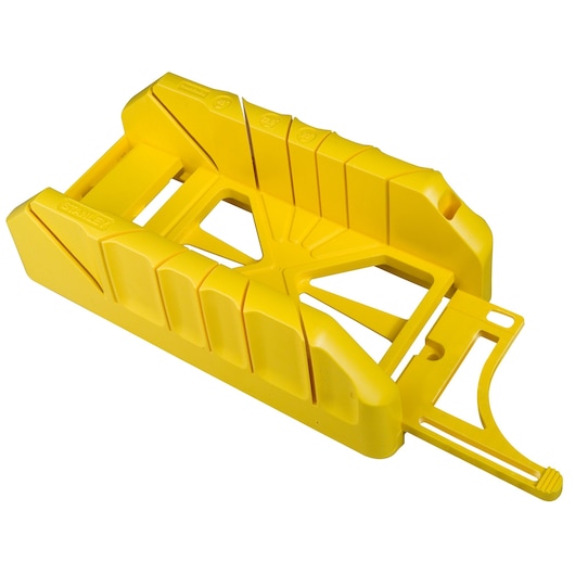 Yellow plastic STANLEY mitre box for precise cutting angles in woodworking projects.