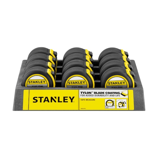 Photo of STANLEY 1-30-656 tape measures with yellow and black casing, displayed in a tray from the front.