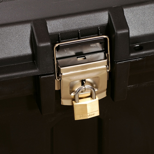STANLEY 1-93-278 black toolbox close-up with gold metal latch and padlock, front angle.