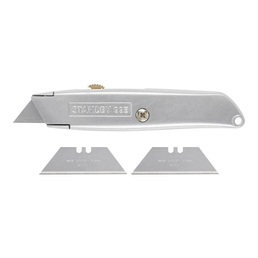 Photo of STANLEY 2-10-099 silver utility knife with two replacement blades, side view on white background.