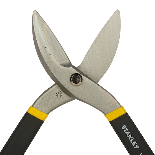 STANLEY 2-14-556 aviation snips close-up, silver blades and black handles, photography on white background.