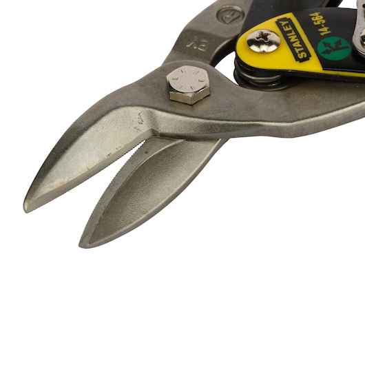 Photo of STANLEY 2-14-564 metal aviation snip, close-up of silver serrated blades, photography on white background.