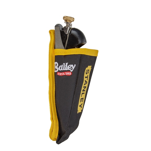 Photo of STANLEY 5-12-060 hand plane in black and yellow fabric holster, product photography, angled view.
