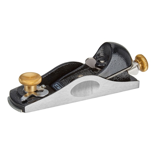 STANLEY 5-12-060 block plane with brass adjustment knob, side angle on white background.