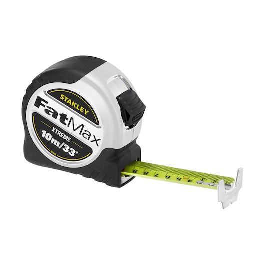STANLEY 5-33-896 tape measure, FatMax Xtreme, 10m/33', black and silver casing, side view on white background.