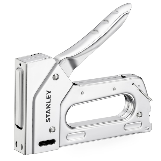 Silver Stanley heavy-duty staple gun with ergonomic handle, designed for fastening tasks and photography use.