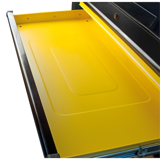 Open yellow metal drawer with a flat surface and raised edge, part of a storage cabinet or tool chest.