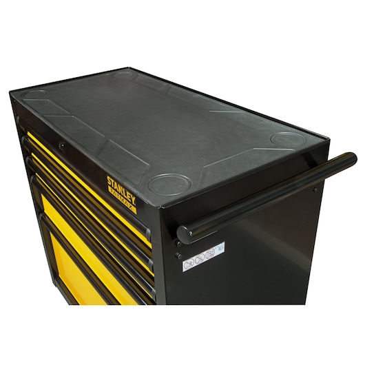 Stanley FatMax black tool chest with yellow drawers and a top handle, shown from an angled view.