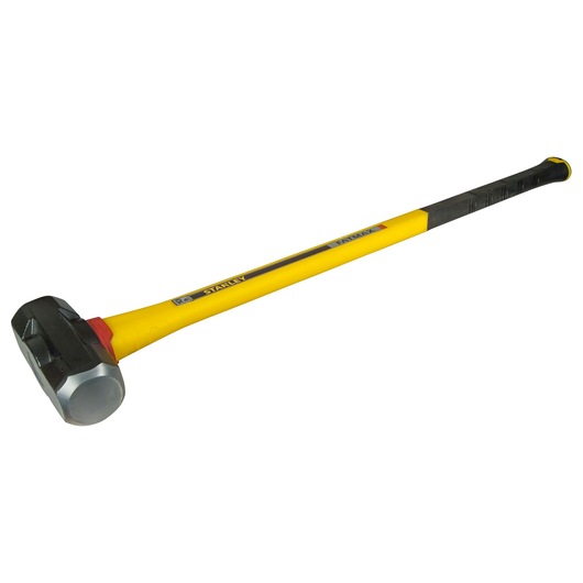 Yellow-handled Stanley sledgehammer with black rubber grip, metal head, angled view on white background.