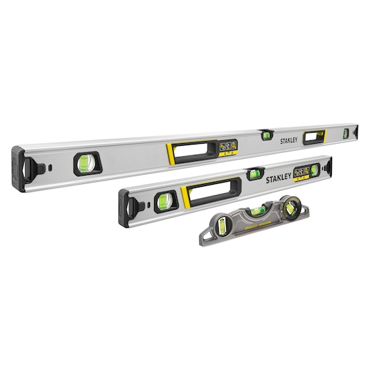 Photo of three STANLEY FMHT43681-1 spirit levels in varying lengths, silver with black and yellow accents, side angle.