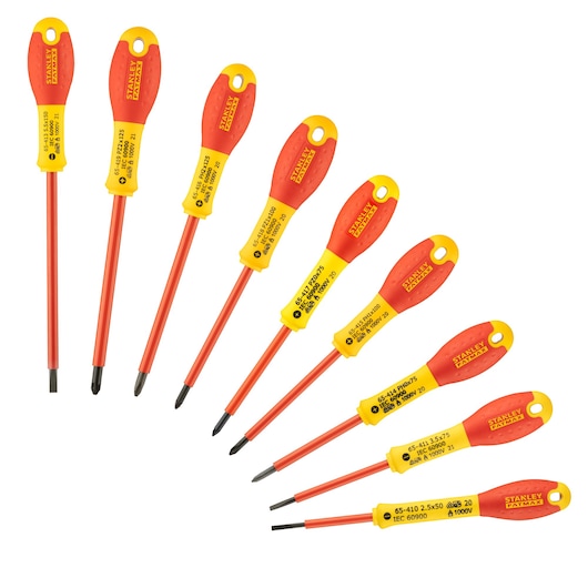 Stanley screwdriver set with red and yellow insulated handles, arranged in a row on a white background.