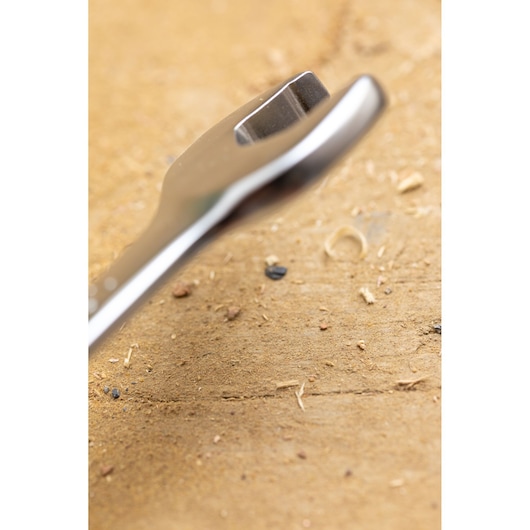STANLEY FMMT13038-0 wrench close-up on wood surface, chrome finish tool head angled to the right.
