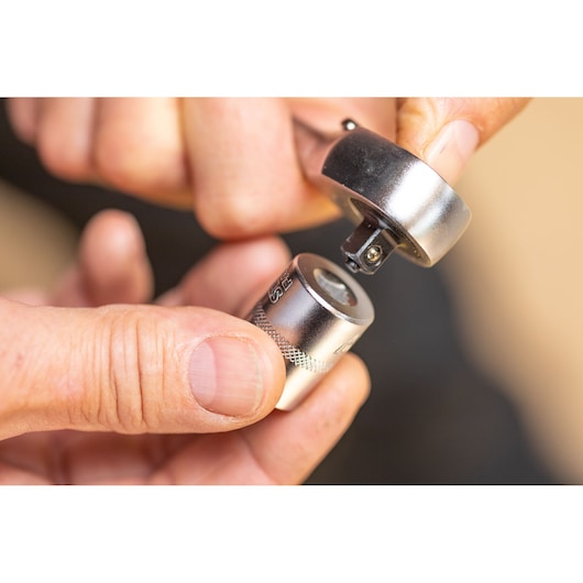 Photo of STANLEY FMMT82676-0 socket wrench head and attachment being connected close-up.