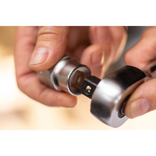 STANLEY FMMT82685-1 ratchet handle and socket close-up, hands assembling, photography category.