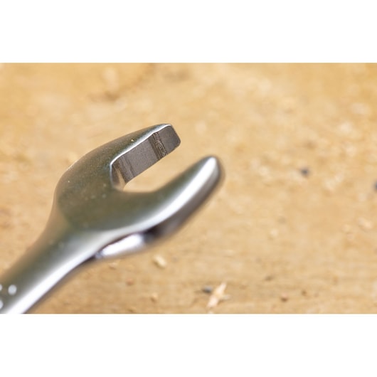 Photo of STANLEY FMMT82902-0 open-end wrench tool close-up on wood surface.