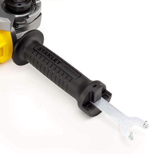 STANLEY KFFMEG220 photography of a black auxiliary grinder handle with integrated wrench, side angle on white background.