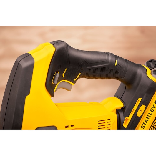 Stanley SFMCS600D1K photography of cordless tool handle, side angle, yellow and black ergonomic grip.