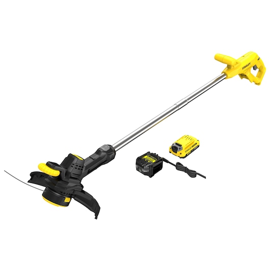STANLEY SFMCST925M1 string trimmer kit with battery and charger, yellow and black, side angle on white background.