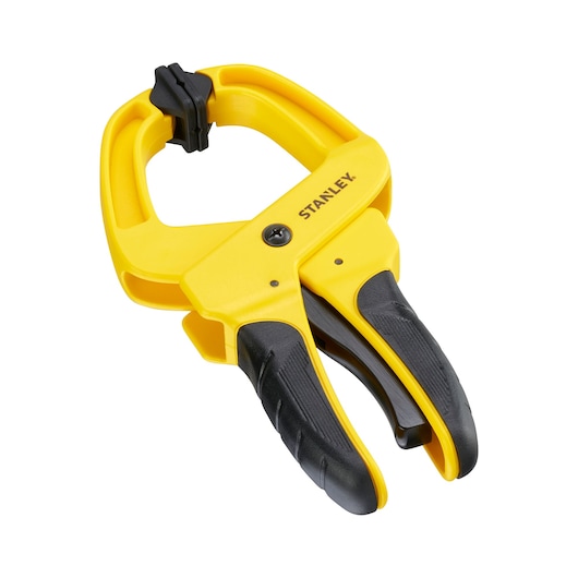 STANLEY STHT0-83199 yellow and black spring clamp, front angle, with ergonomic grip, on white background.