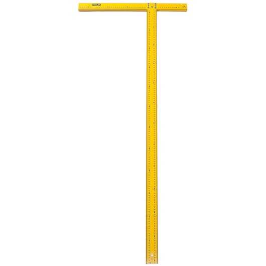 Stanley yellow T-square with ruler markings for measuring and drawing straight lines on surfaces.