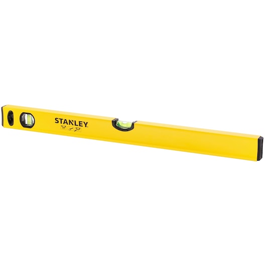 Yellow Stanley spirit level tool with two vials for measuring horizontal and vertical alignment.