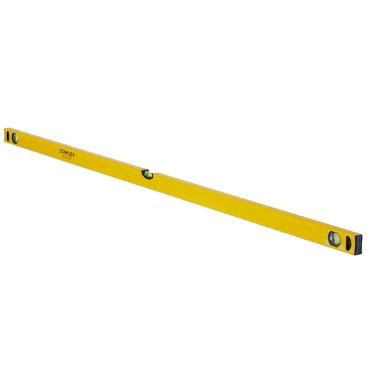 Yellow Stanley spirit level tool with three bubble vials, used for aligning surfaces in construction and photography.