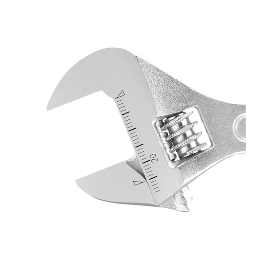 Close-up of a silver adjustable wrench with measurement scale on the jaw, isolated on white background.