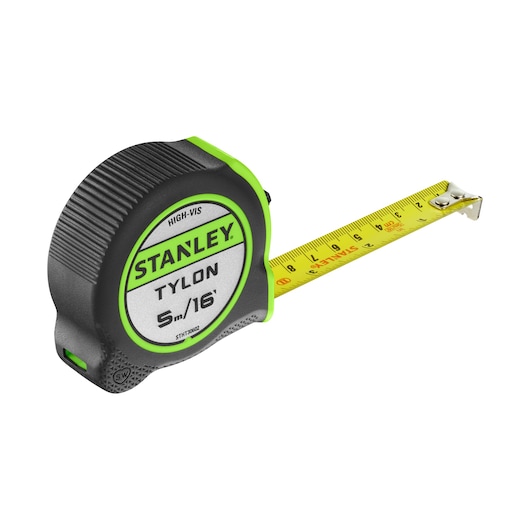 STANLEY STHT30602-1 tape measure with black and green case, extended yellow blade, side view.
