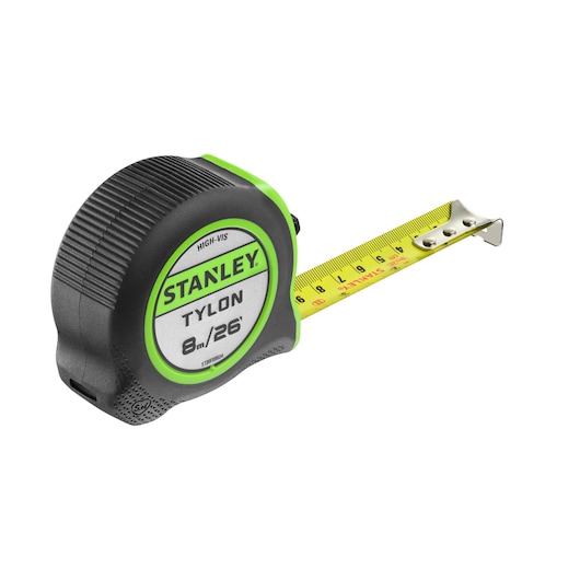 STANLEY STHT30604-1 tape measure with black and green case, yellow blade extended, angled on white background.