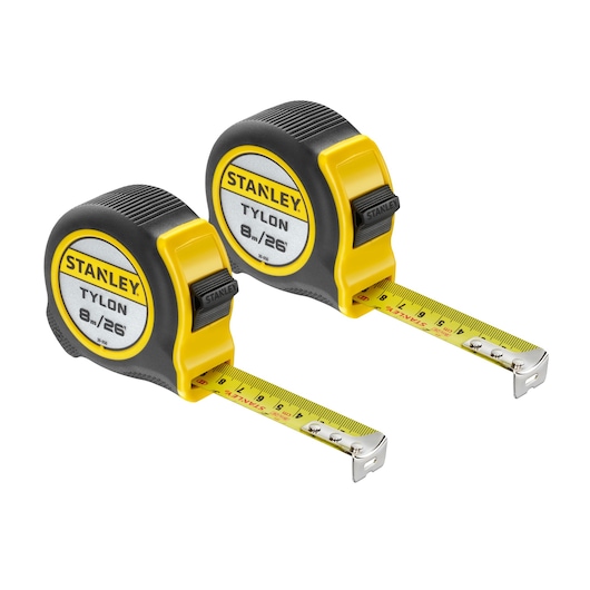 STANLEY STHT39520-0 tape measures, yellow and black, 8m/26ft, angled front on white background.