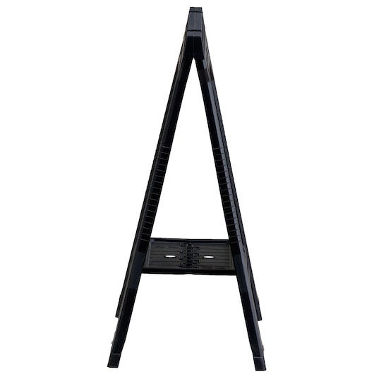 Side view of a black folding plastic sawhorse with a shelf, photographed against a white background.