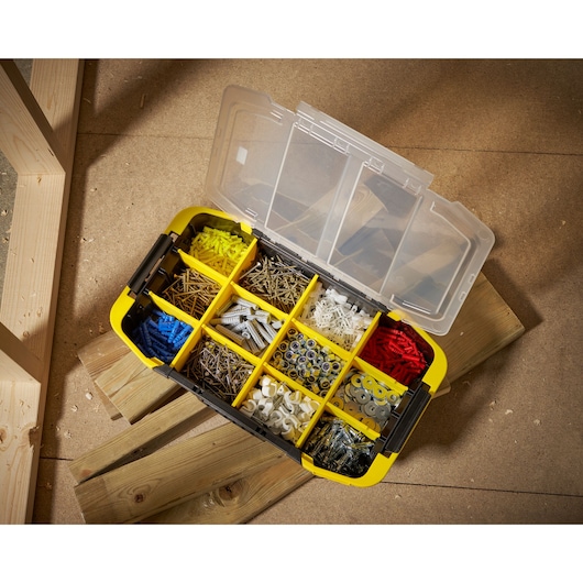 STANLEY STST1-71983 organiser box top view, yellow case with compartments for screws, anchors, and washers.