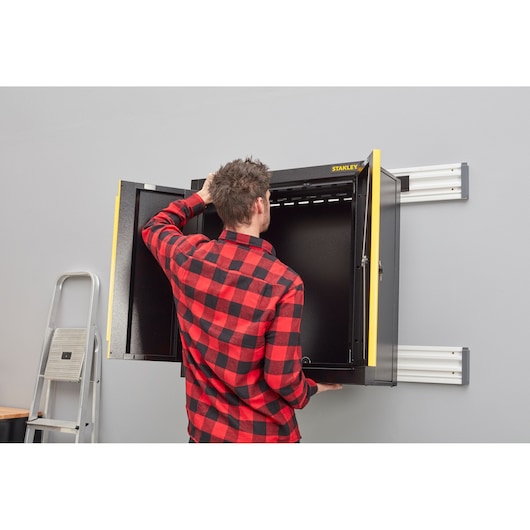 STANLEY STST97598-1 wall-mounted black storage cabinet front angle with open doors.