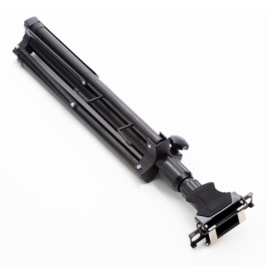 STANLEY SXLS31333E black photography tripod, folded, side angle on white background.