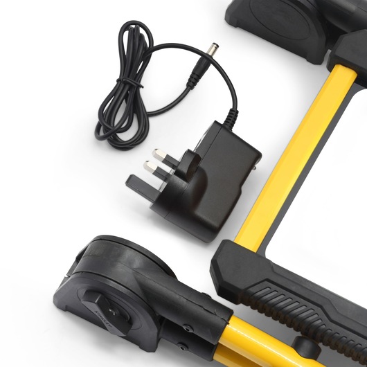 Photo of STANLEY SXLS31338E lock with yellow bar, black ends, and UK power adapter, top view on white background.