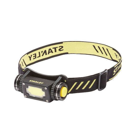STANLEY SXLS50100E headlamp with yellow and black adjustable strap, front angle photo on white background.