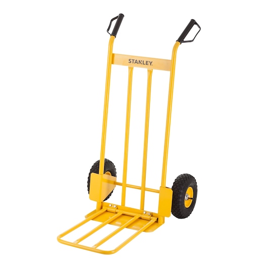 Yellow Stanley hand truck with two black wheels and handles, used for moving heavy items.