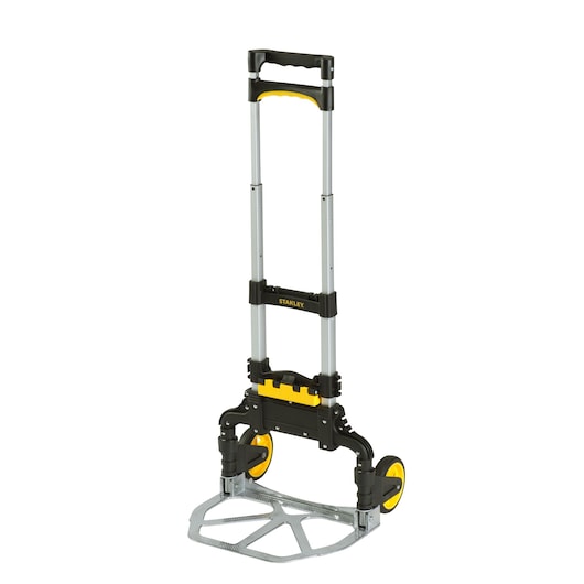 Stanley foldable hand truck with yellow and black accents, designed for easy transport of heavy loads.
