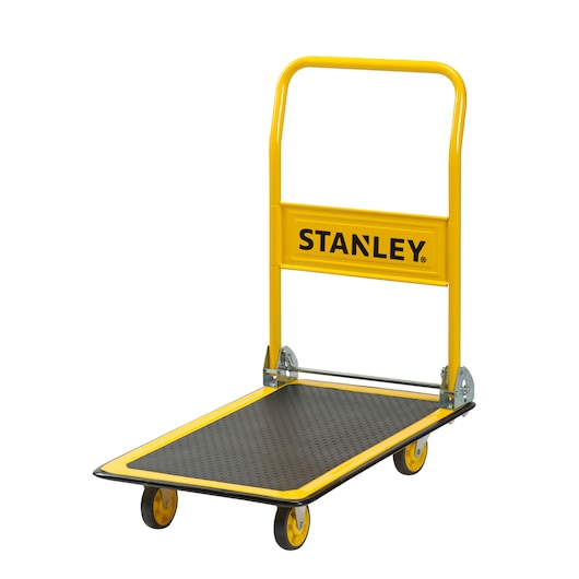 Yellow Stanley foldable platform trolley with four wheels and a black non-slip surface.